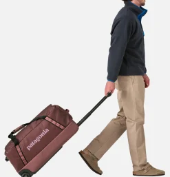 Black Hole Wheeled Duffel 70L Dulse Mauve